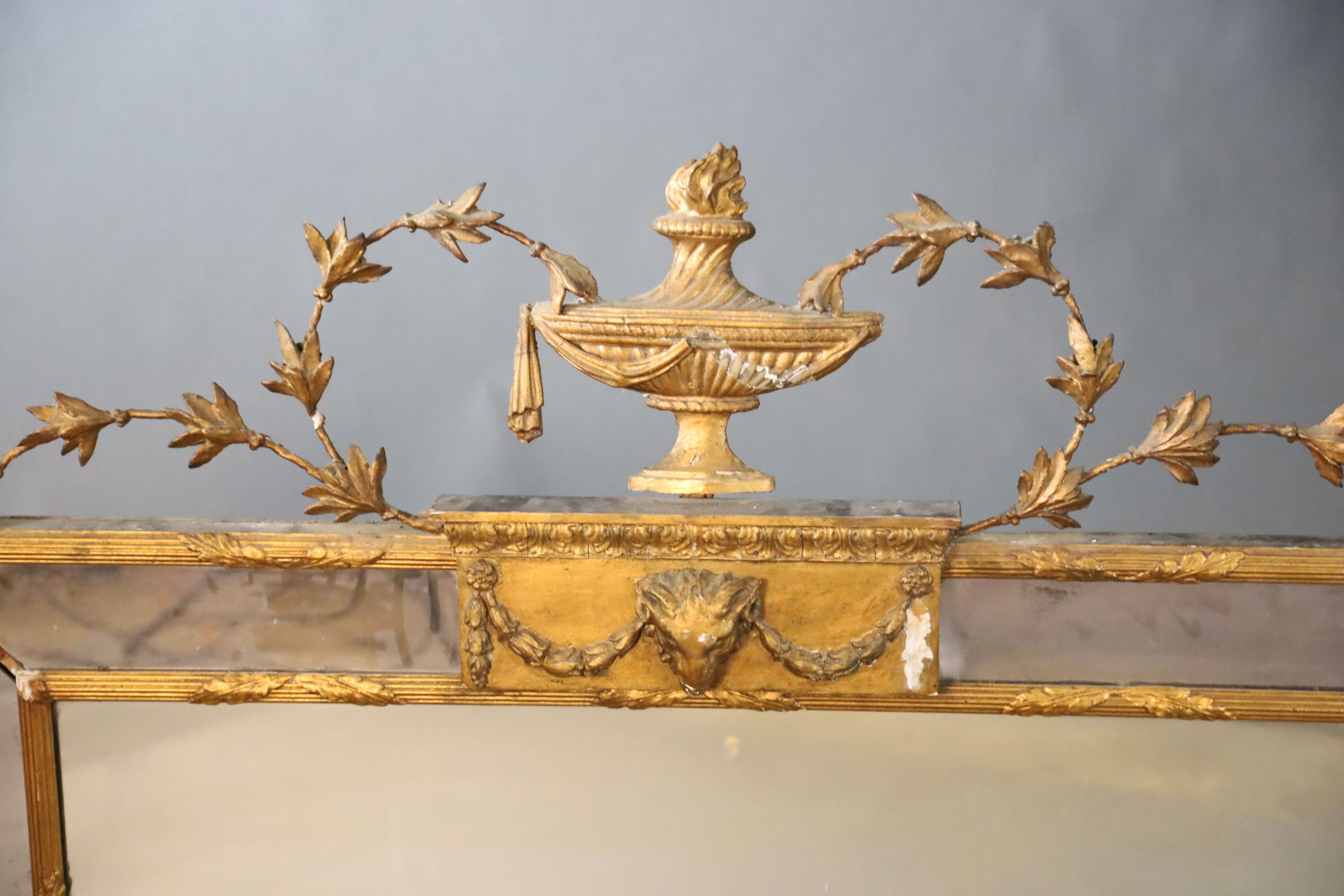 An early 20th century gilt gesso overmantel, W.137cm H.107cm